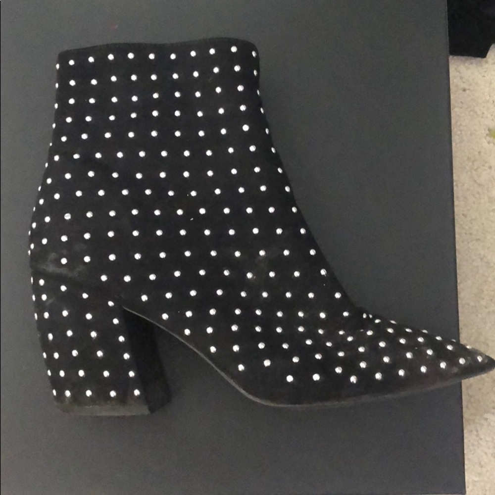 Black studded pointed toe boots